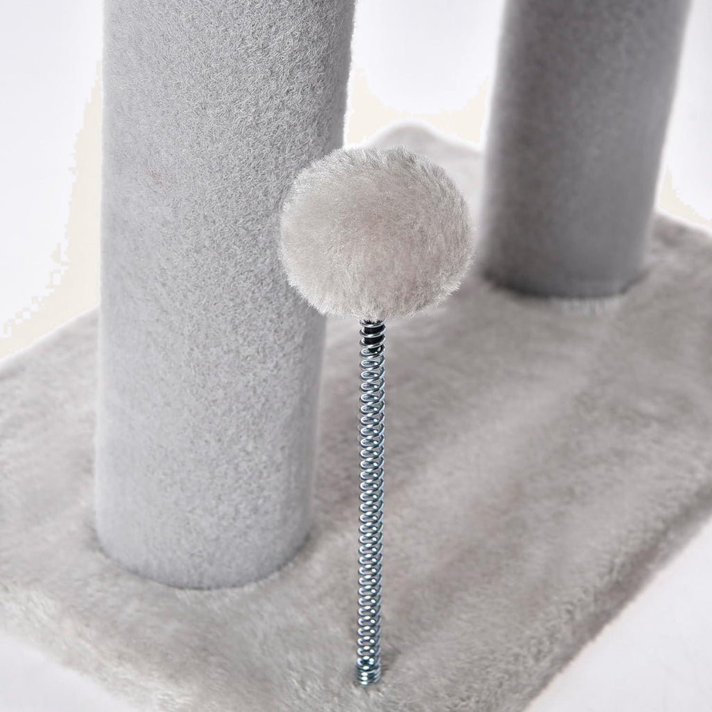 Spring-mounted pom-pom ball