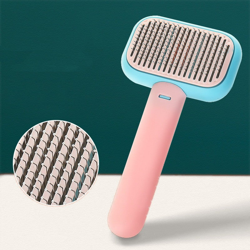 Massage comb in pink