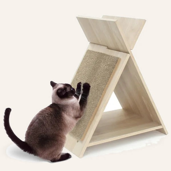 Cat using the scratcher